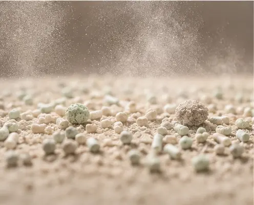 Close-up of fine cat litter particles illustrating dust and fines during handling